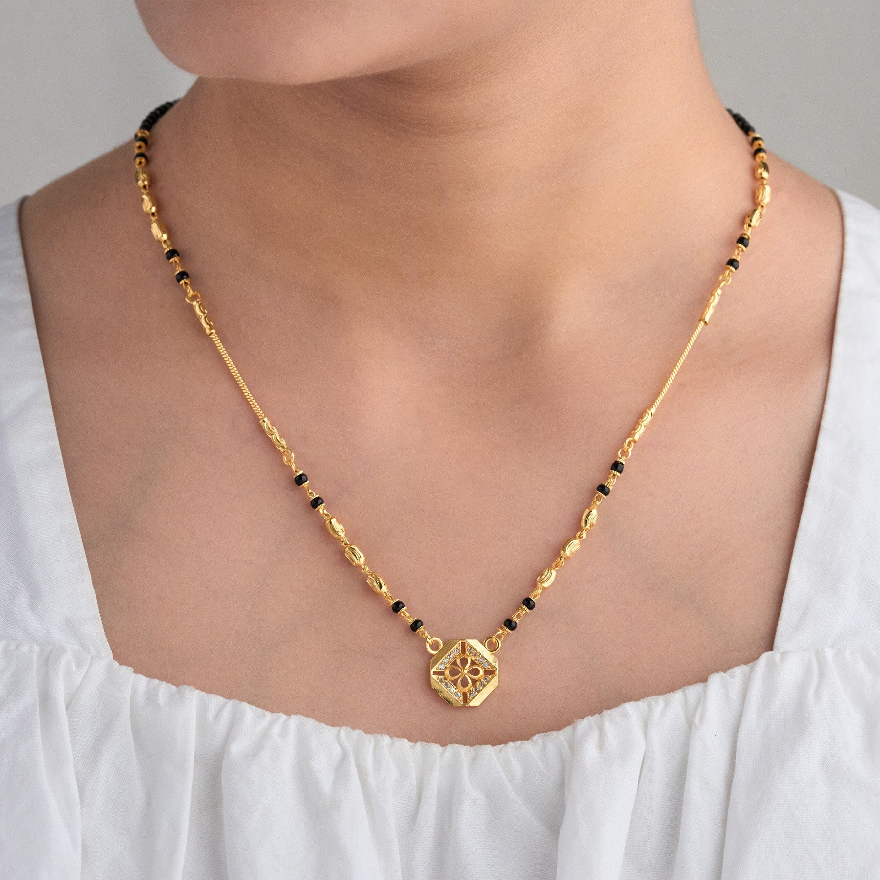 Gold Plated Artificial Stones Studded And Beaded Mangalsutra