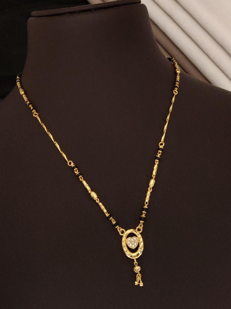 Oval Pendant Mangalsutra with Heart Design AD Diamond Gold-Plated Designer Mangalsutra